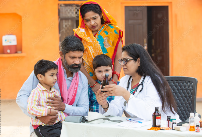 Pediatric clinician conducting developmental consultation with an Indian family in a rural clinic setting.